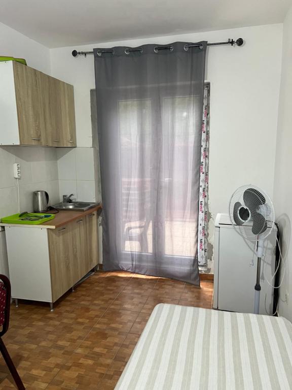 Kuchyň nebo kuchyňský kout v ubytování Green Villa