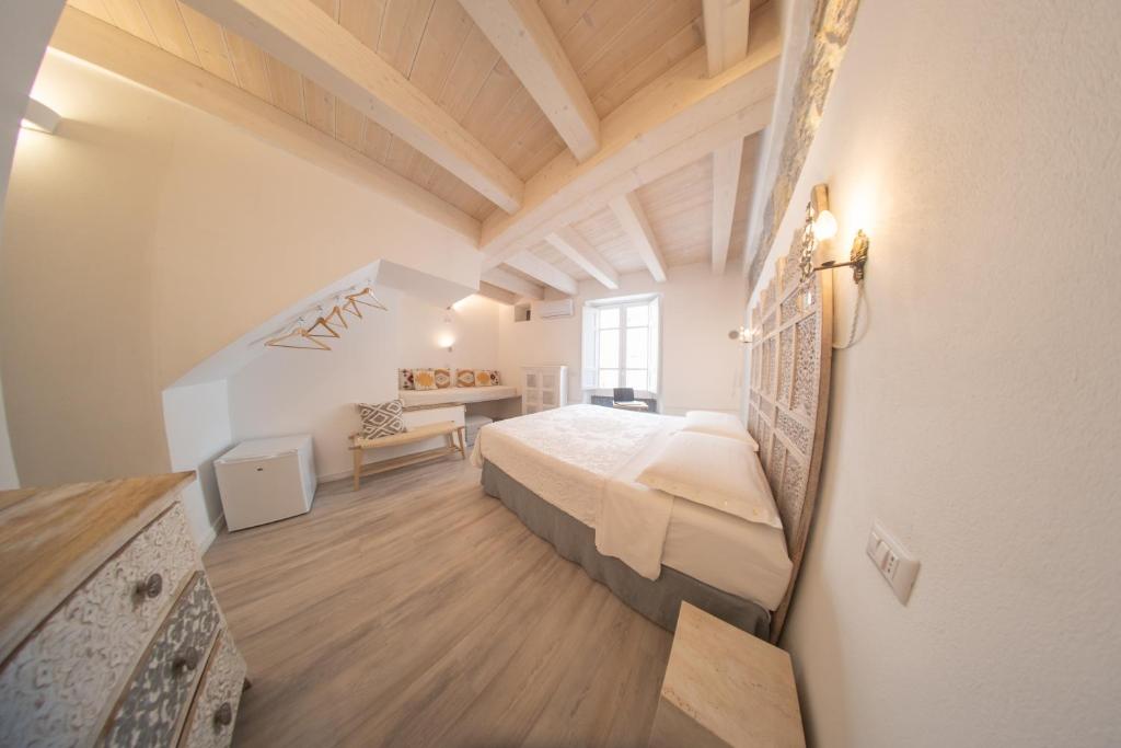 Postel nebo postele na pokoji v ubytování B&B Terra - Stanza Viaggio