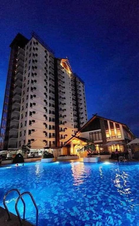 Bazén v ubytování Cosy Nest Royal Oceancrest Mactan nebo v jeho okolí