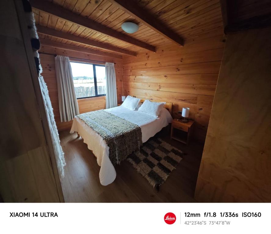 Postel nebo postele na pokoji v ubytování HelChiloé Cabañas