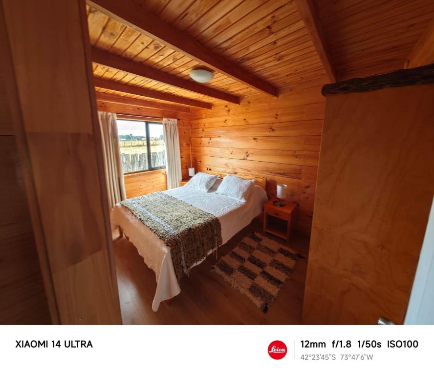Postel nebo postele na pokoji v ubytování HelChiloé Cabañas