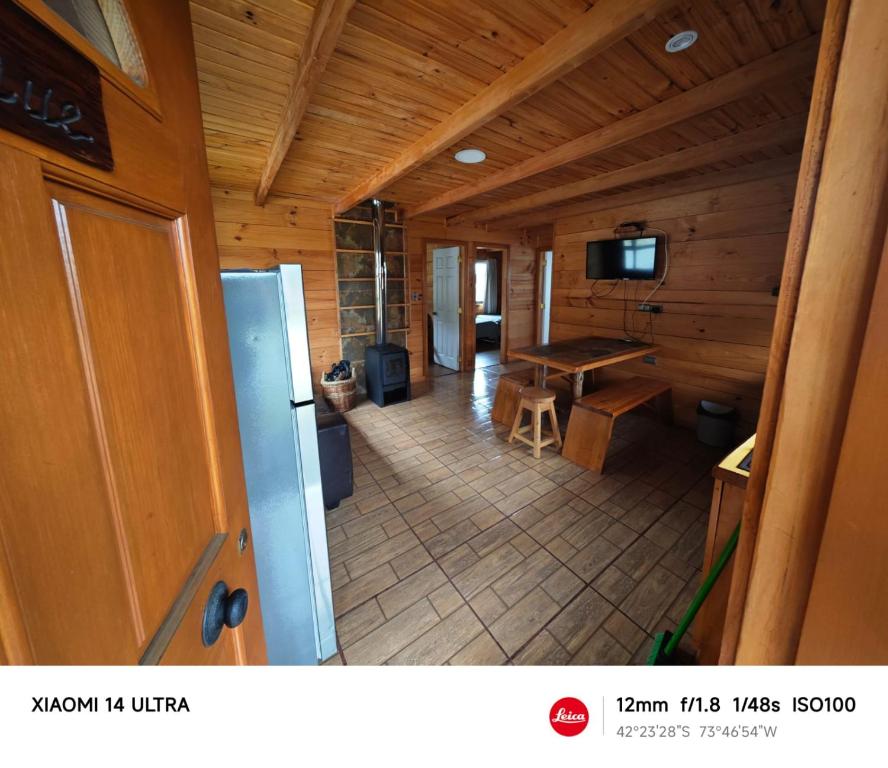 TV a/nebo společenská místnost v ubytování HelChiloé Cabañas