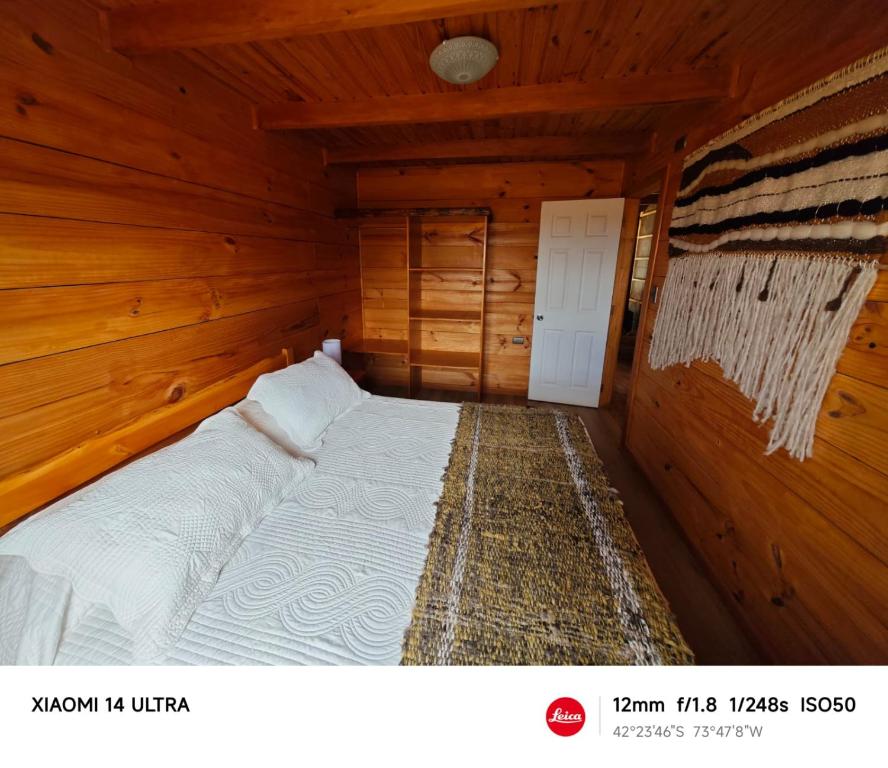 Postel nebo postele na pokoji v ubytování HelChiloé Cabañas