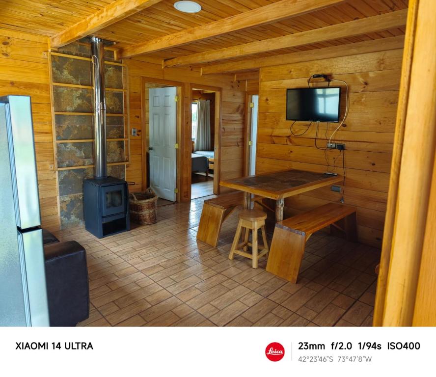 TV a/nebo společenská místnost v ubytování HelChiloé Cabañas