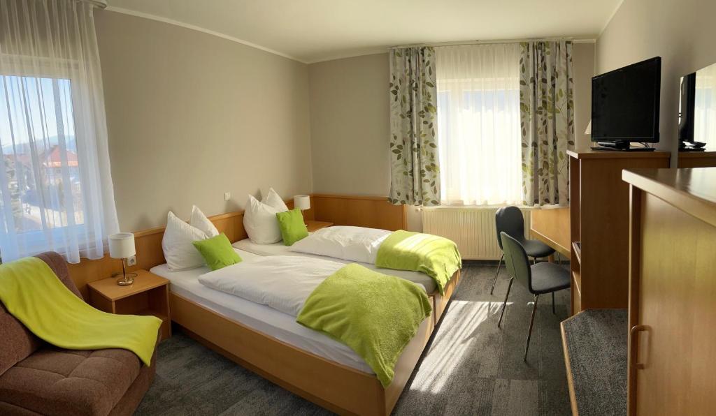 Postel nebo postele na pokoji v ubytování Pension Kaiserhof