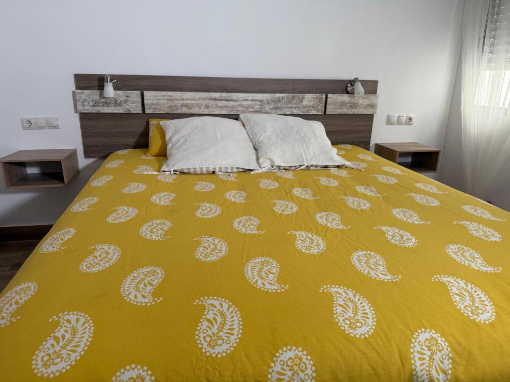 Posteľ alebo postele v izbe v ubytovaní Apartamento Avenida Principal II
