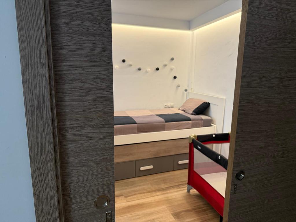 Posteľ alebo postele v izbe v ubytovaní Apartamento Avenida Principal II