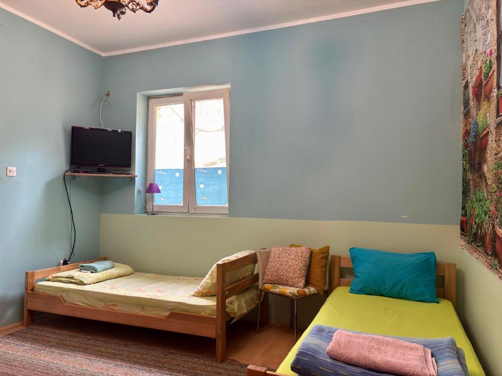 TV a/nebo společenská místnost v ubytování Vracar Affordable Suites - Vracar Povoljni Stanovi