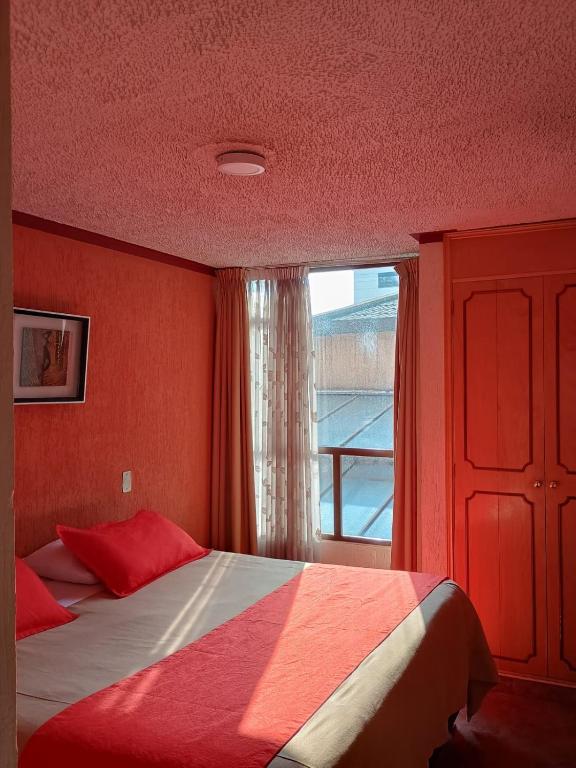 Postel nebo postele na pokoji v ubytování Hoteles Bogotá Inn Galerías