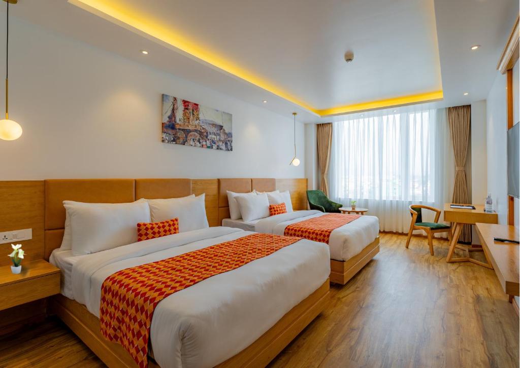 Voodi või voodid majutusasutuse Hotel Anuttara toas