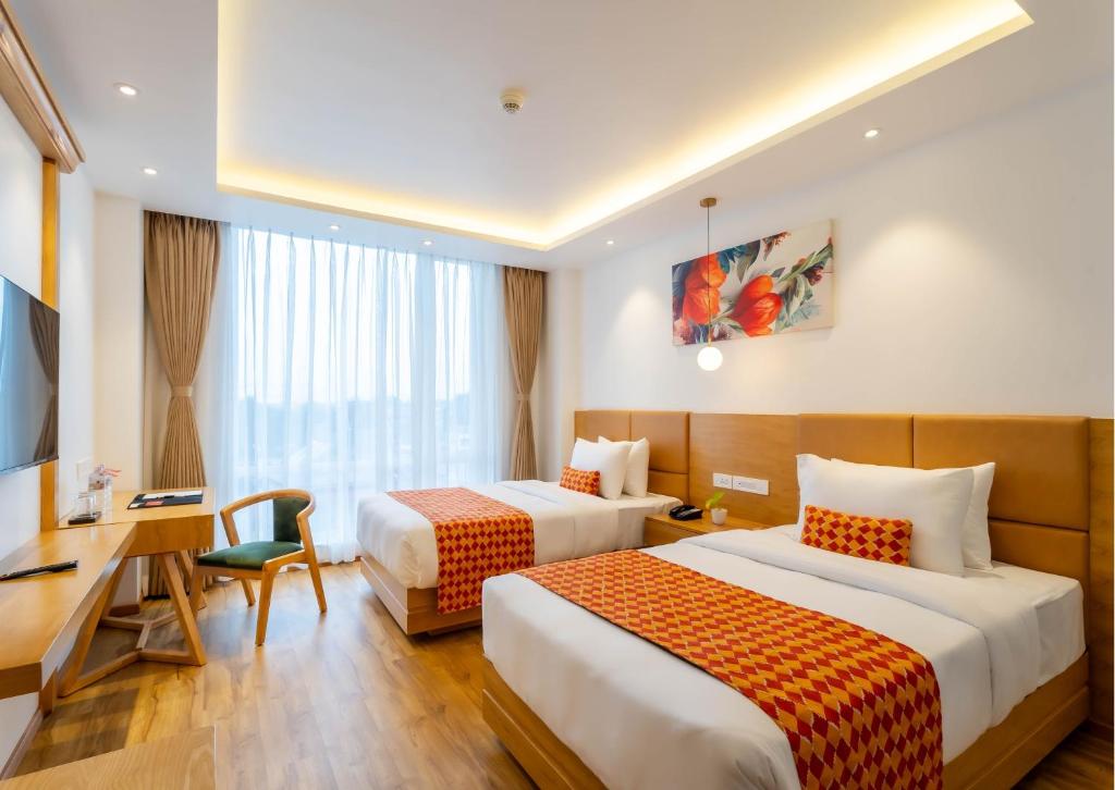 Voodi või voodid majutusasutuse Hotel Anuttara toas