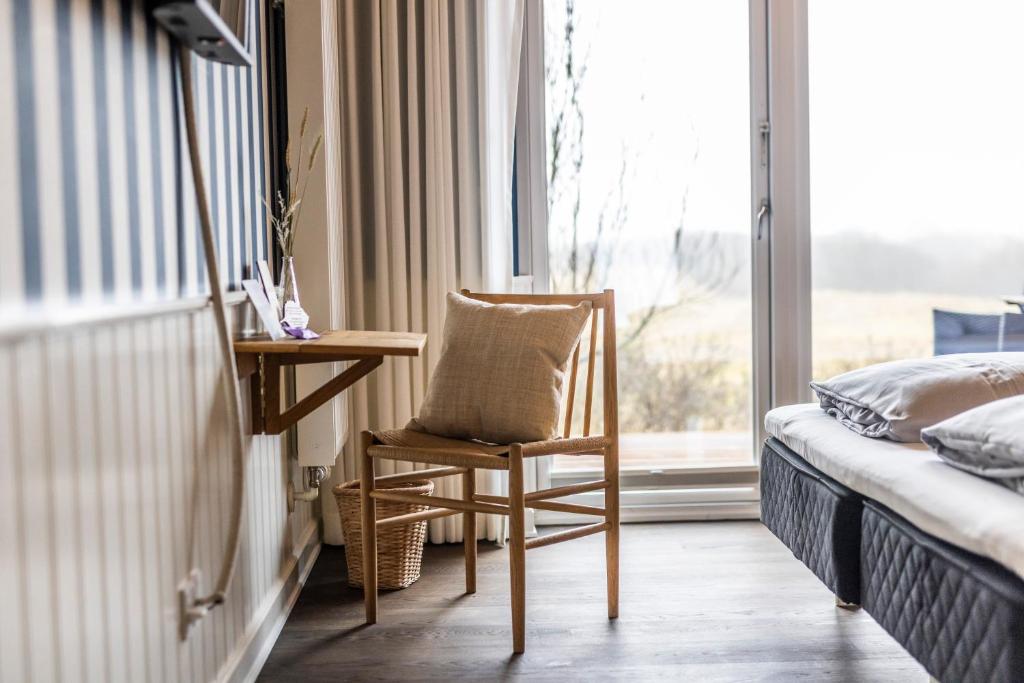 Postel nebo postele na pokoji v ubytování Kellers Badehotel