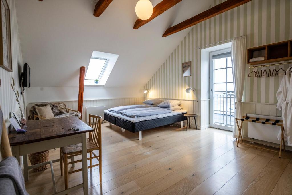 Postel nebo postele na pokoji v ubytování Kellers Badehotel