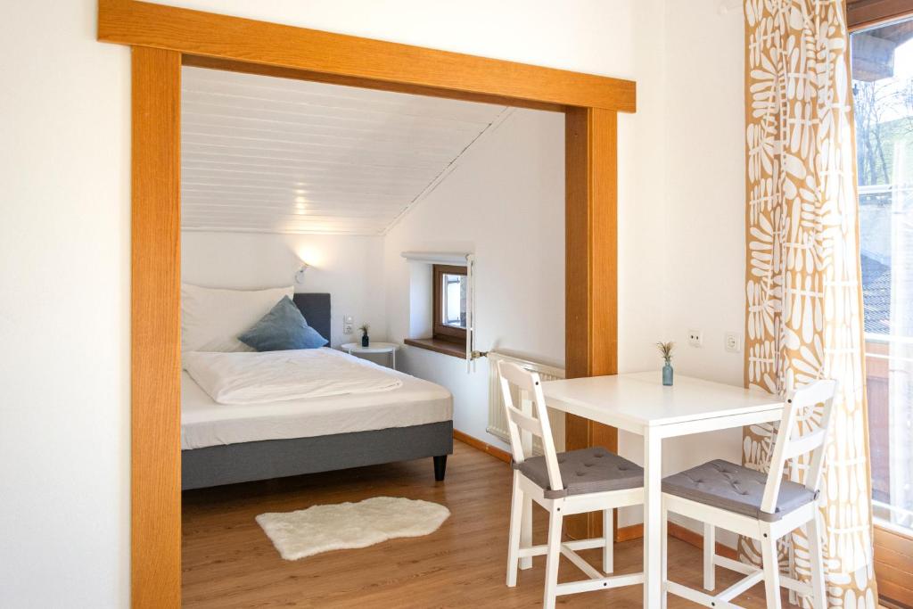Postel nebo postele na pokoji v ubytování Marktlhaus Goldegg