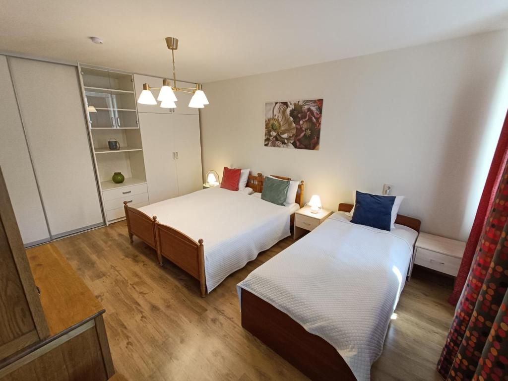 Katil atau katil-katil dalam bilik di Cozy apartment