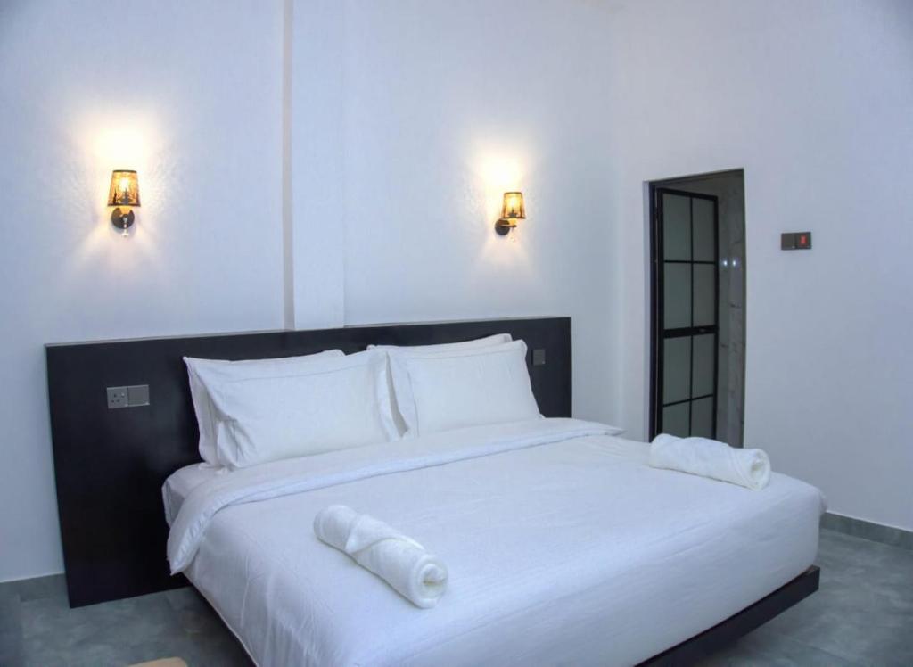 Postel nebo postele na pokoji v ubytování Rome Transit Hotel
