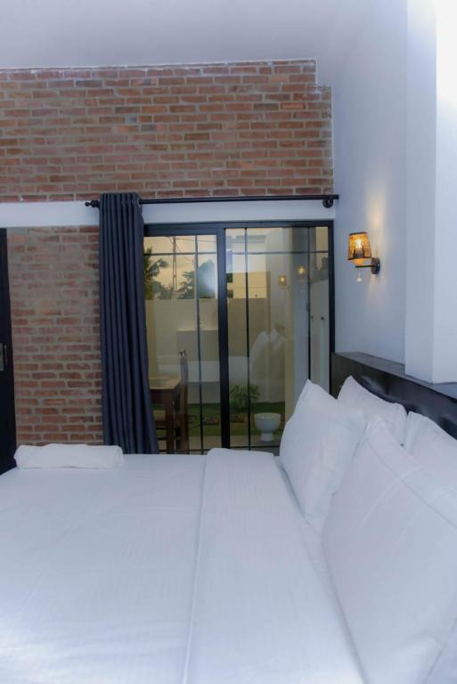 Postel nebo postele na pokoji v ubytování Rome Transit Hotel