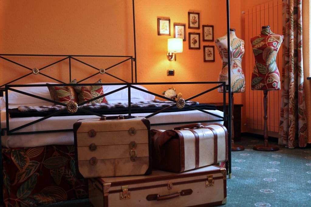 Posteľ alebo postele v izbe v ubytovaní La Meridiana ReIais & Chateaux