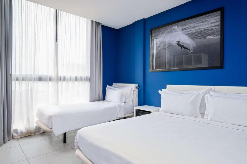 Postel nebo postele na pokoji v ubytování Radisson Blu Resort Taghazout Bay Surf Village