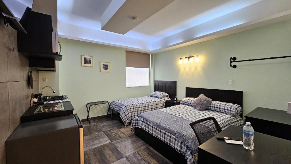 Postel nebo postele na pokoji v ubytování A30 SUITE BLACK PLUS Modernas Suites en Casona Acequia - Confort y Estilo en Cuautitlán Izcalli Tepotzotlán"