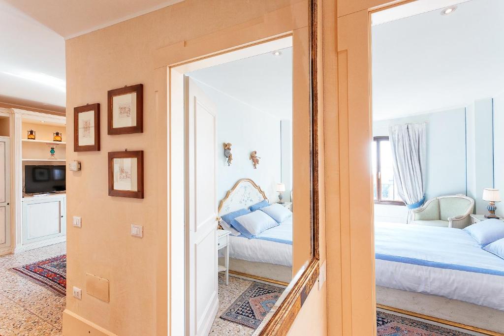 Posteľ alebo postele v izbe v ubytovaní Deluxe Apartments Lagoon View