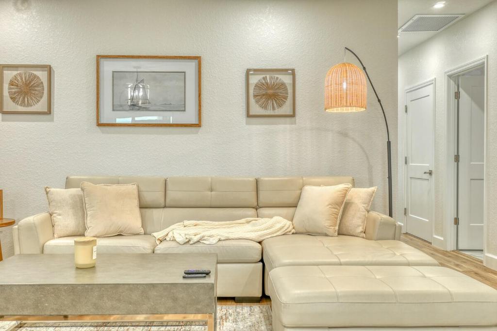 a living room with a couch and a table at Waterfront Family Vacation , Near Ocean and Mineral Springs, 7 sleeps in Rotonda West