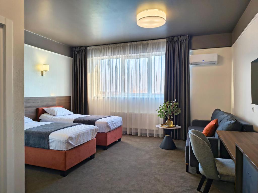 Postel nebo postele na pokoji v ubytování Mini Hotel on Brovarskaya