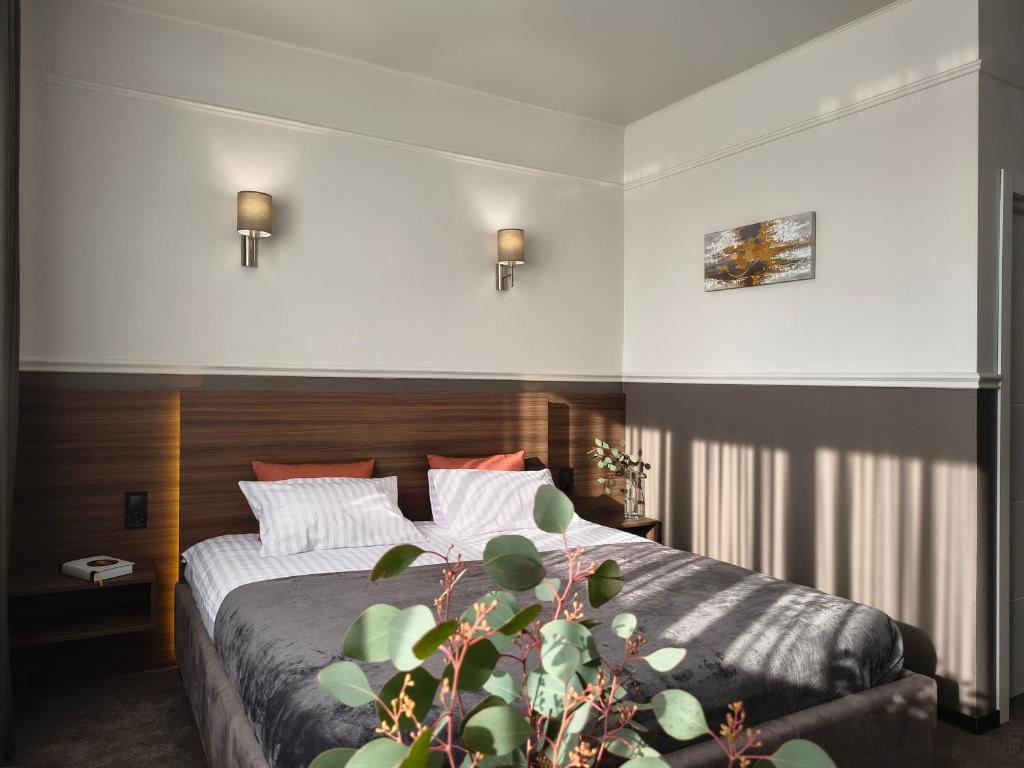 Postel nebo postele na pokoji v ubytování Mini Hotel on Brovarskaya