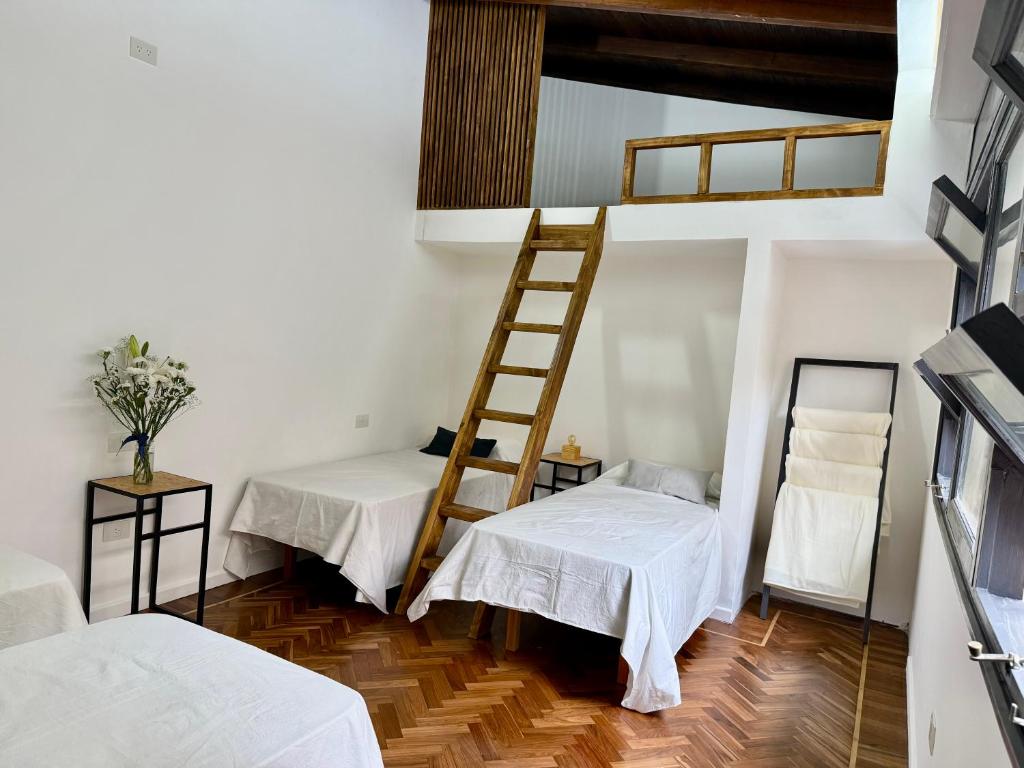 Postel nebo postele na pokoji v ubytování Clivias Hostel