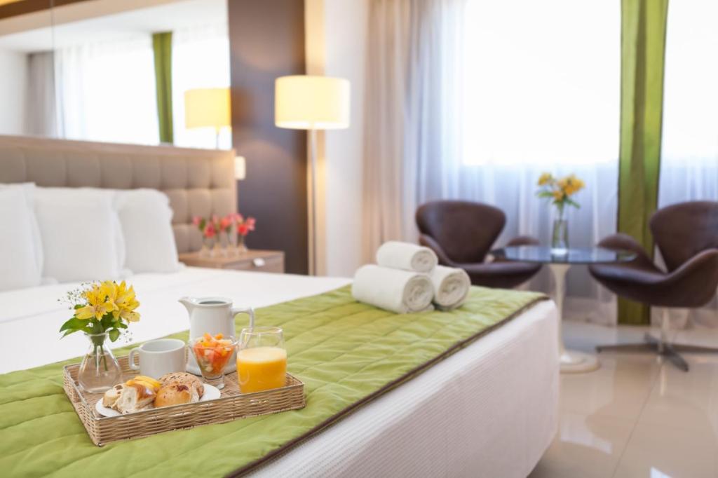 Uma área de estar em eSuites Savassi Toscanini