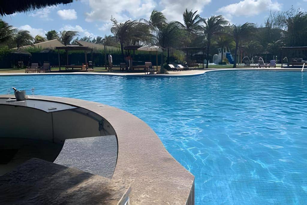 Swimmingpoolen hos eller tæt på Apartamento em Fortaleza - CE