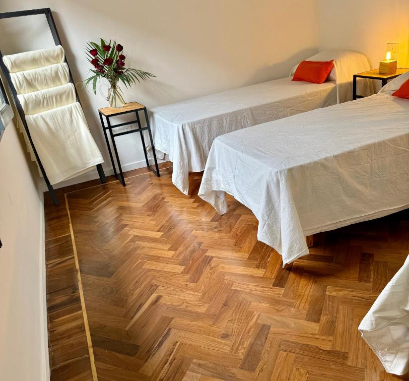 Postel nebo postele na pokoji v ubytování Clivias Hostel