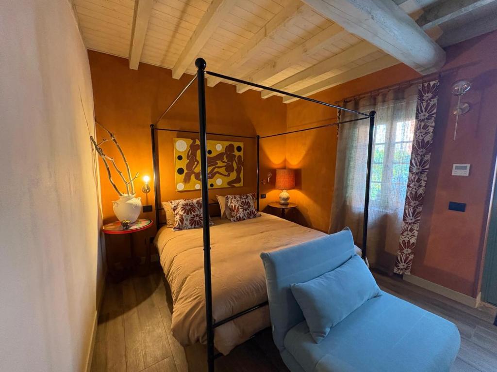 Postel nebo postele na pokoji v ubytování B&B Villa la Canonica con piscina privata a Padernello