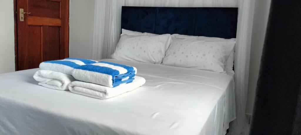 Postel nebo postele na pokoji v ubytování Royal Palms Apartment A2