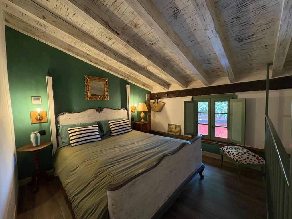 Postel nebo postele na pokoji v ubytování B&B Villa la Canonica con piscina privata a Padernello