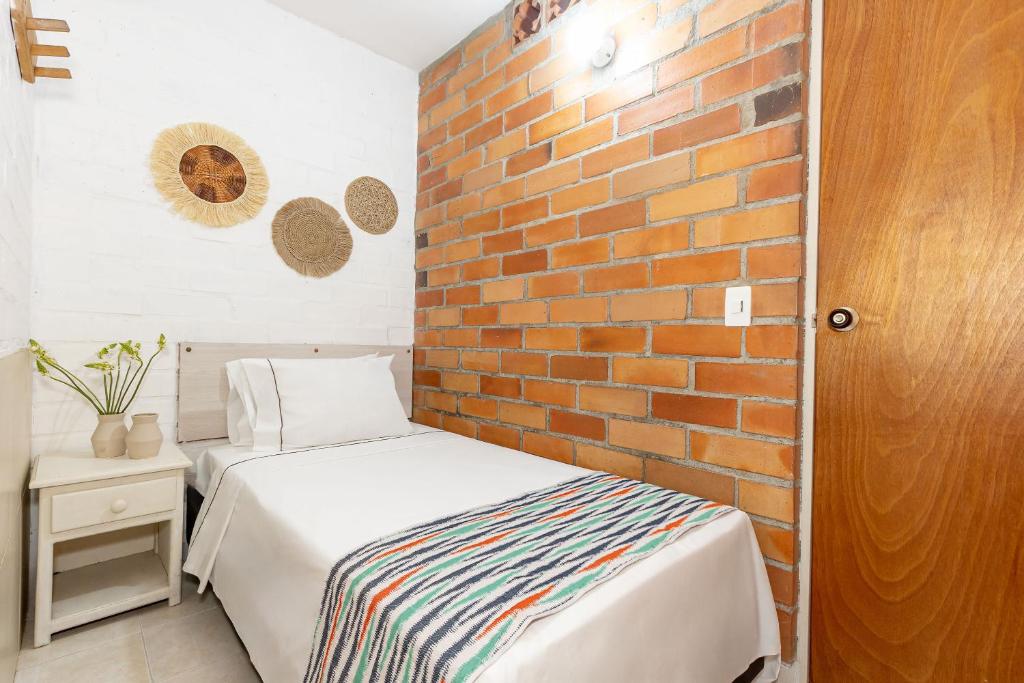 Postel nebo postele na pokoji v ubytování Gran Caribe Hotel