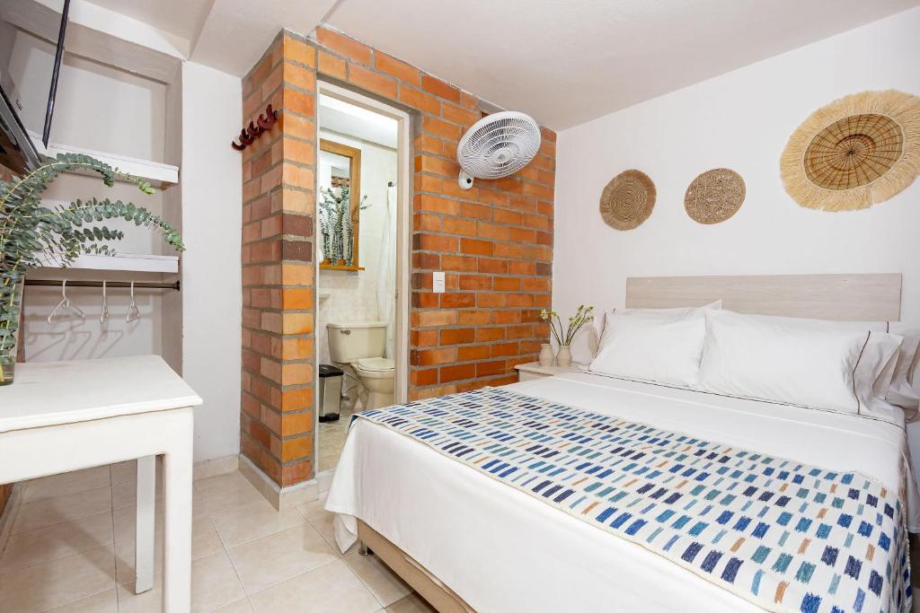 Postel nebo postele na pokoji v ubytování Gran Caribe Hotel