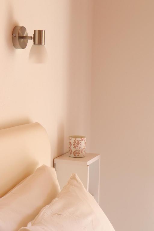 Postel nebo postele na pokoji v ubytování Kondilw Rooms