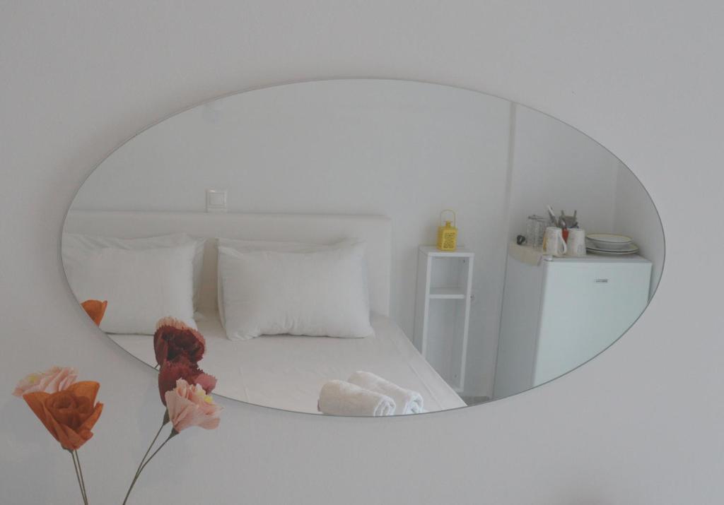 Postel nebo postele na pokoji v ubytování Kondilw Rooms