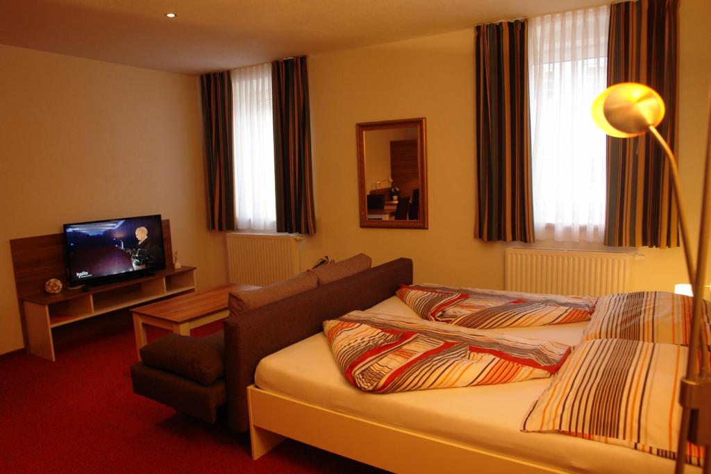 Posteľ alebo postele v izbe v ubytovaní Hotel Garni Daniela Urich