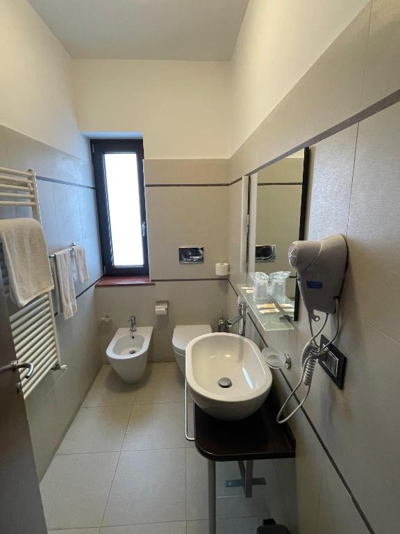 Rooms affittacamere - Habitación Deluxe (2 Adultos + 1 Niño)