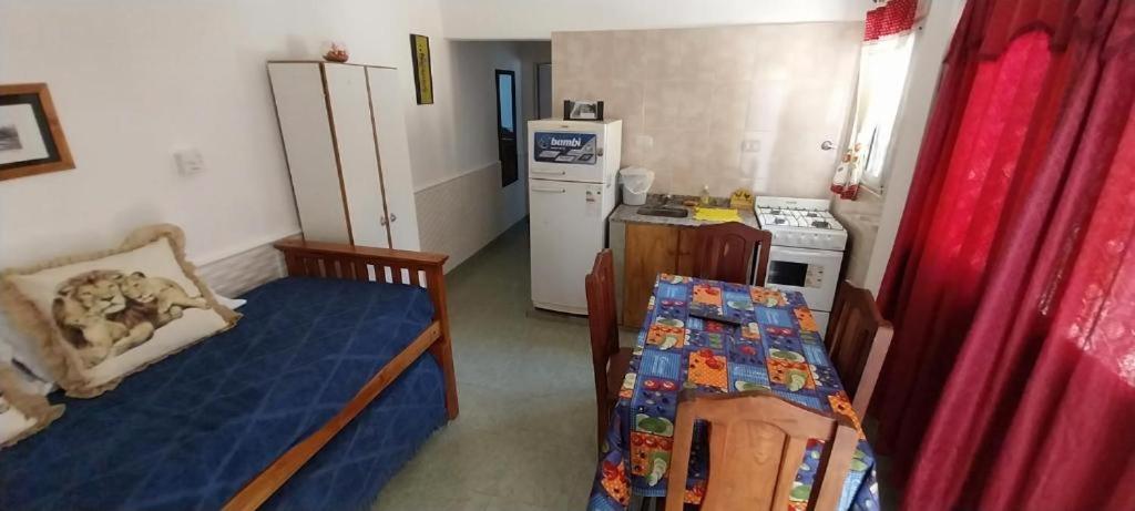 Postel nebo postele na pokoji v ubytování Hospedaje María