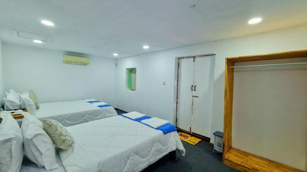 Postel nebo postele na pokoji v ubytování Europe Enchanted Bungalow Koh Rong