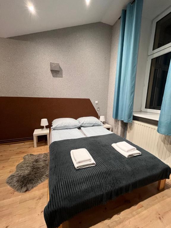 Posteľ alebo postele v izbe v ubytovaní Apart West13 Kraków