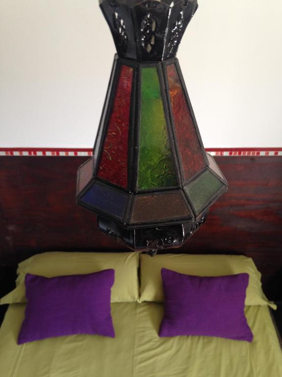 Postel nebo postele na pokoji v ubytování Boutique Hostal "Casa Justa"