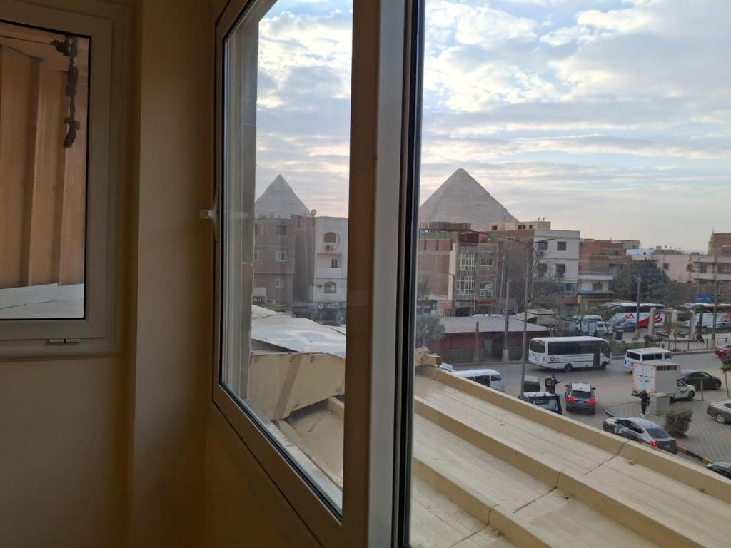 Nespecifikovaný výhled na destinaci Káhira nebo výhled na město při pohledu z hotelu