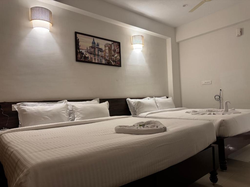 Postel nebo postele na pokoji v ubytování La Millionaire Luxury Resort - TIE Hotels & Resorts