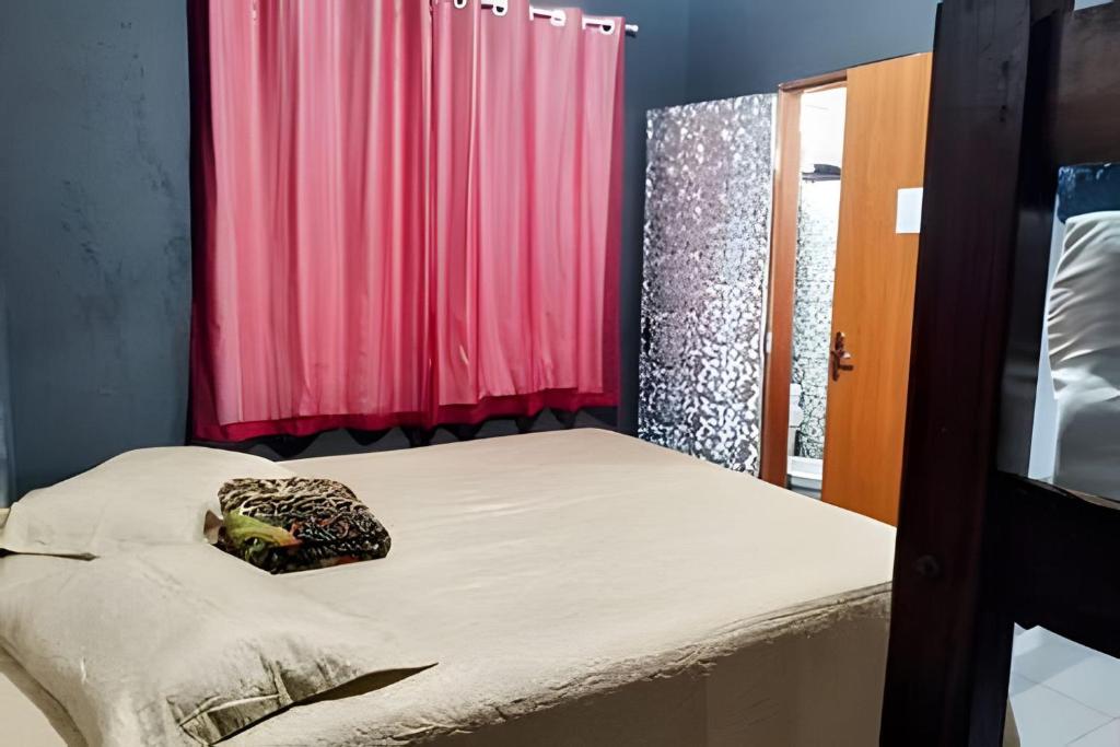 Postel nebo postele na pokoji v ubytování Temporada no Atalaia