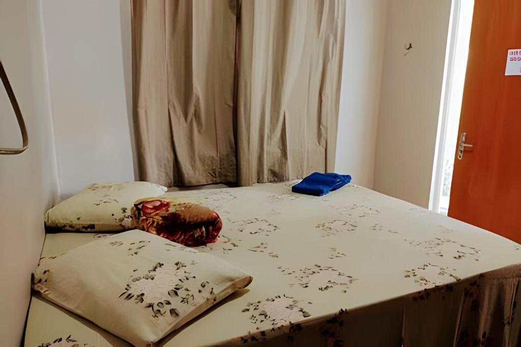Postel nebo postele na pokoji v ubytování Temporada no Atalaia