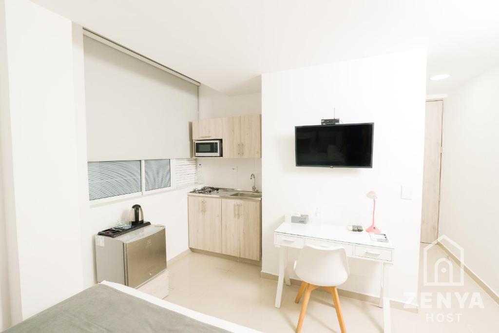Kuchyň nebo kuchyňský kout v ubytování Hotel On By Zenya Host